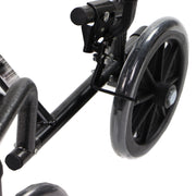 Chaise Roulante De Transport Pour Aînés Pliable En Acier Noir Vue Proche Frein Et Roue Arrière