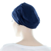 Bonnet Cancer Sans Couture En Bambou Bleu Avec Un Tissu Décoré Vue De Derrière